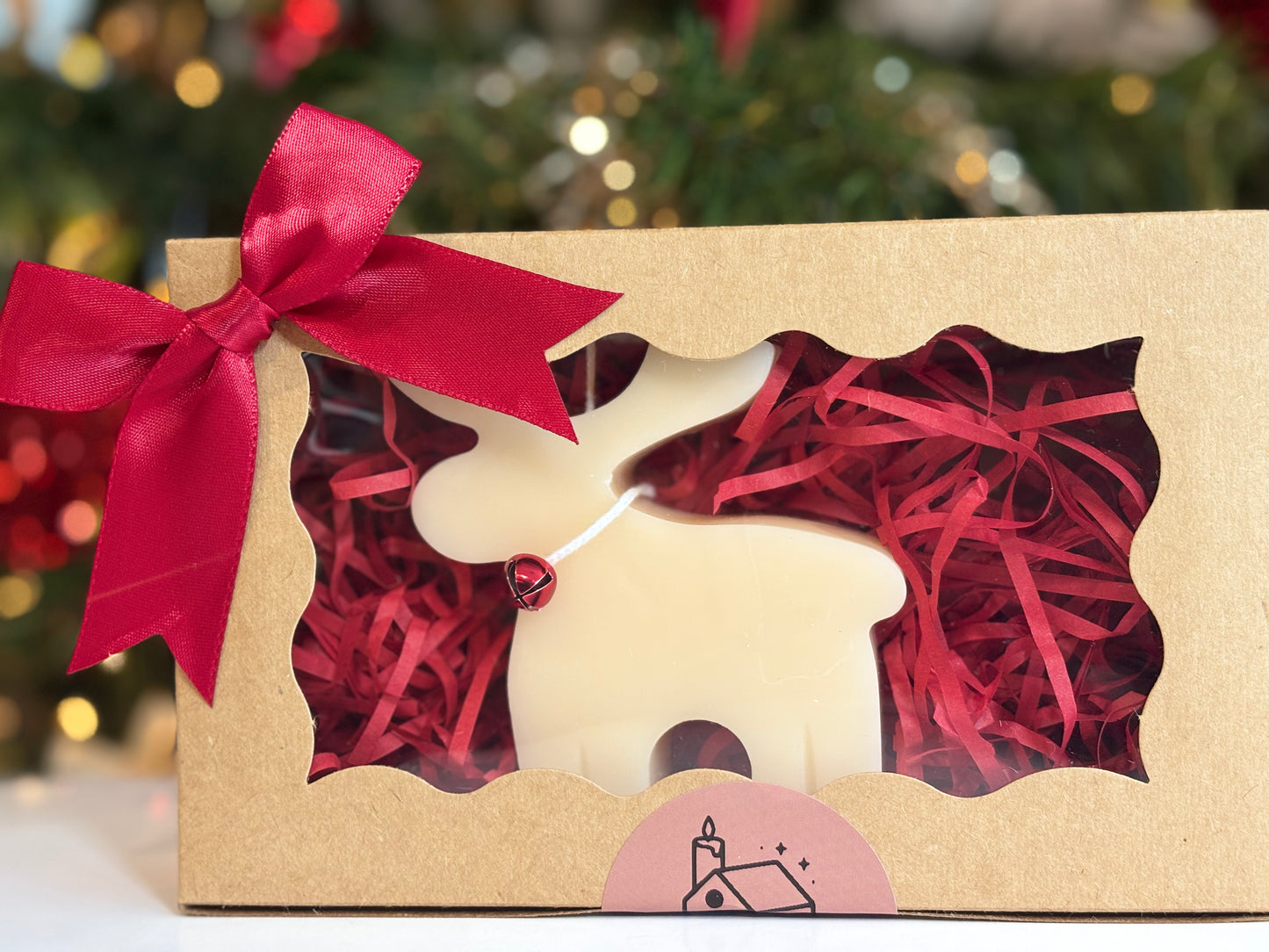 Handmade reindeer soy candle gift box with festive holiday packaging